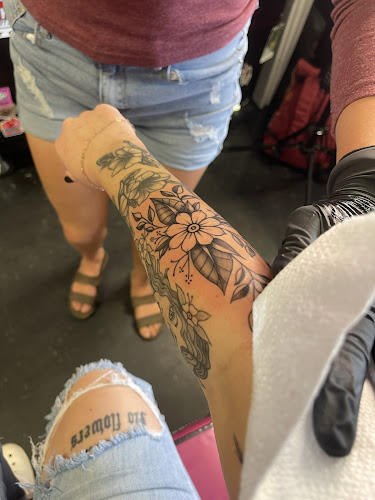 Work by Dixie Ink & Art