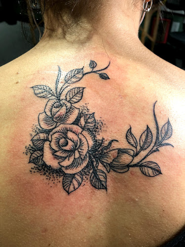 Work by Arkham Tattoo