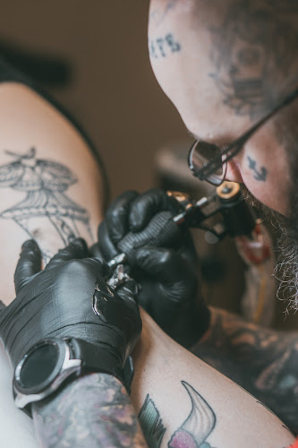 Work by Purgatory Tattoo Co.