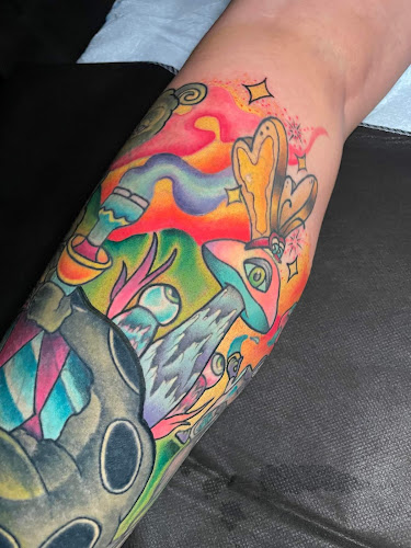 Work by Lucky Cricket Tattoo