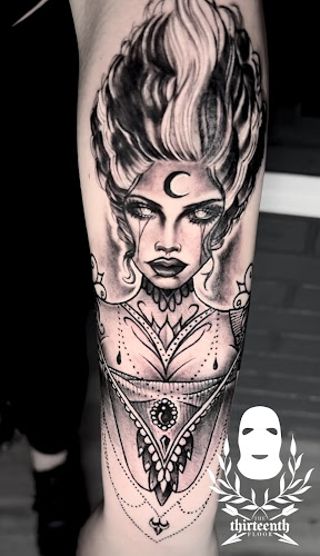 Work by The Thirteenth Floor Tattoo & Art Studio