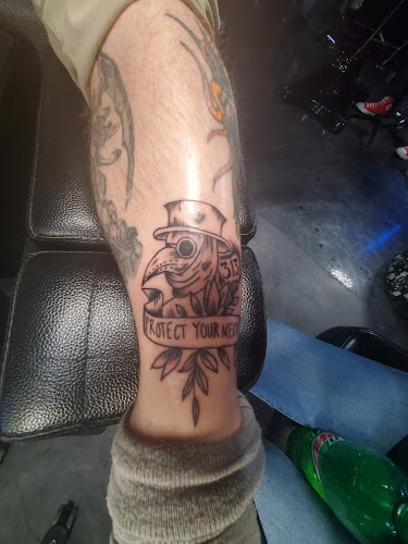 Work by Lucky 38 tattoos