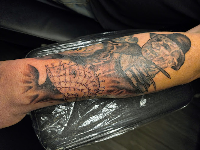 Work by Open Eyes Ink Parlor
