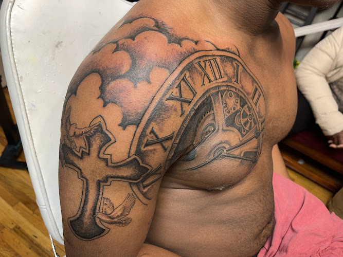 Work by BullsEye Ink Tattoo Parlor