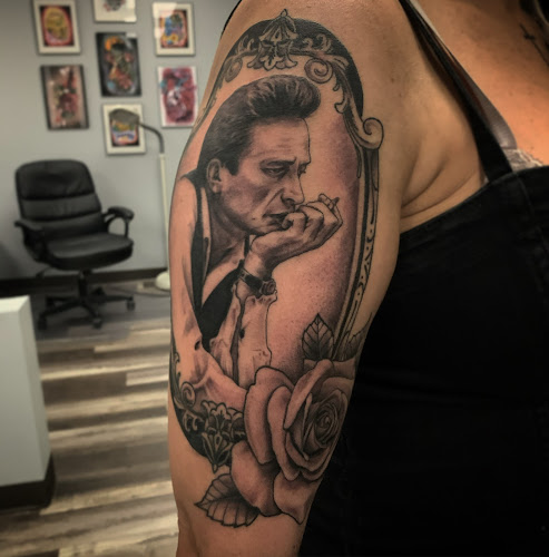 Work by Electric Wave Tattoo