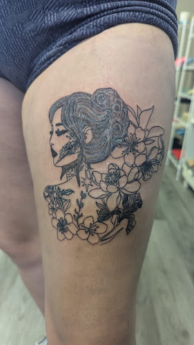 Work by Doc Foster's Tattoo & Spirit Therapy