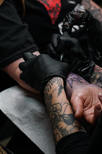 Work by Black Bee Tattoo Parlor