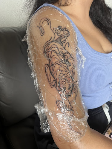 Work by Da Kandy Shop Tattoo Studios WE MOVED DOWN THE STREET