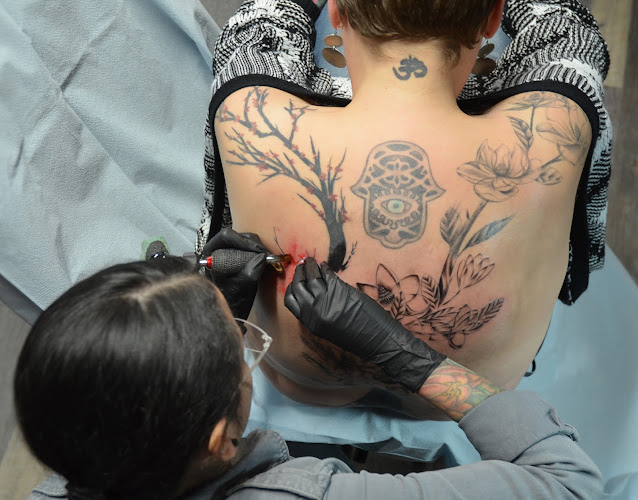 Work by Lady Octopus Tattoos