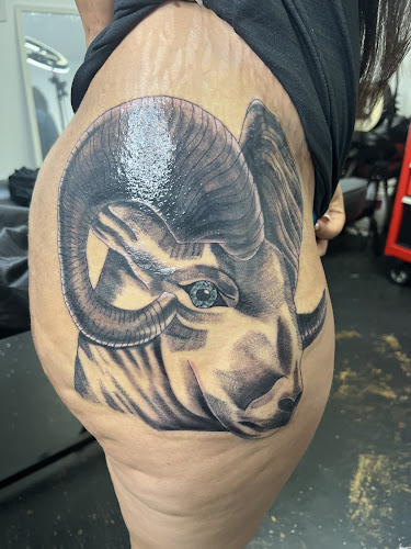 Work by The Cajun Picasso Tattoo Shop