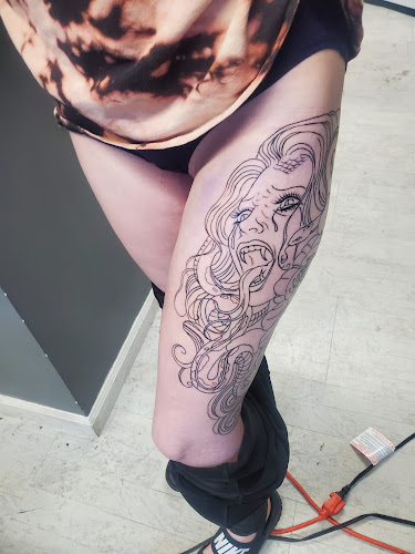 Work by A.R.T. a real testament tattoo studio