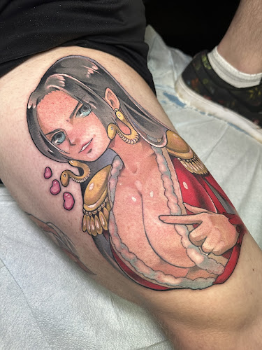 Work by Lifted Veil Tattoo