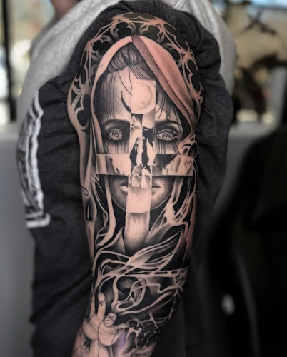 Work by Mothership Tattoo Company