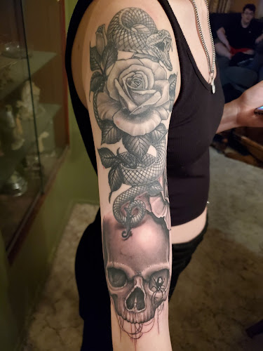 Work by Steel-Skins Tattoo Co