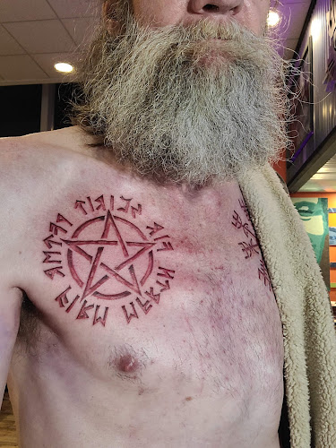 Work by Savage Kat Tattoo Co