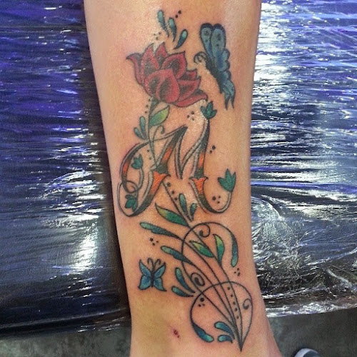 Work by Salvation Tattoo