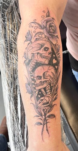 Work by Sling'n Ink Tattoos