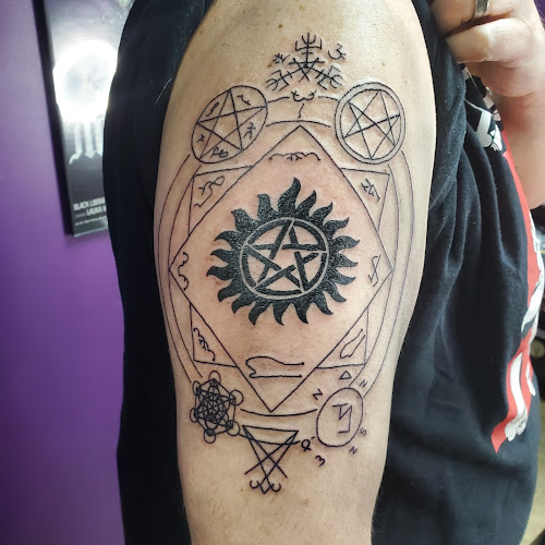 Work by Neon Drop Tattoo
