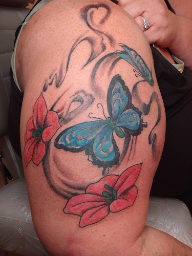 Work by Agony Body Art Tattoo & Piercing Studio