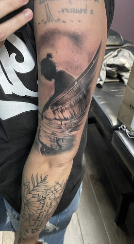 Work by Evolution Tattoo & Body piercing