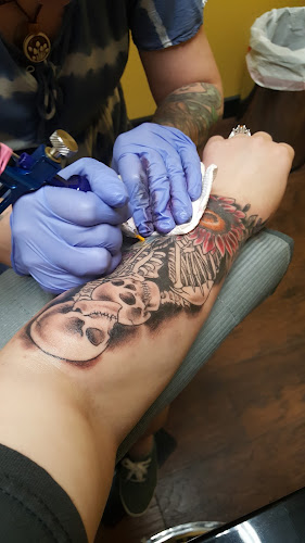 Work by Dolly Dagger Tattoo