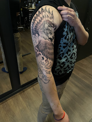 Work by Red Sparrow Tattoo Collective