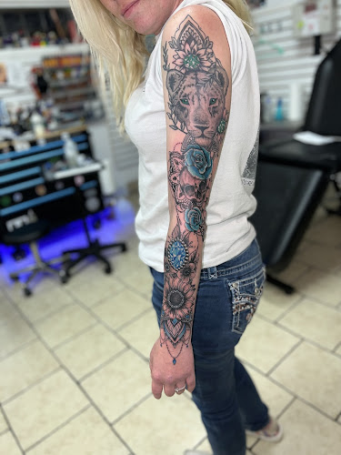 Work by Holy Tattoos