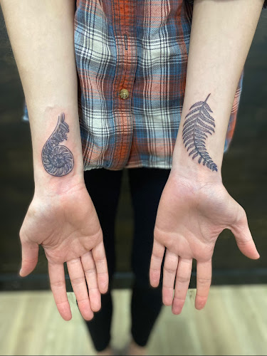 Work by Sacred Rose Tattoo