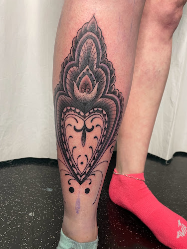 Work by Well Wishes Tattoo