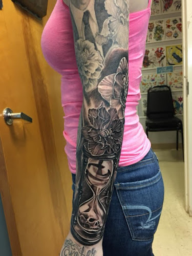 Work by Tommy Painter's Body Art Tattoo LLC