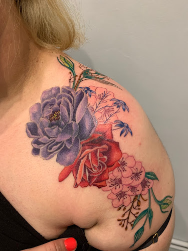 Work by Berwyn Custom Tattoo Co.