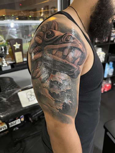 Work by Black Flamingo Collective Tattoo Shop