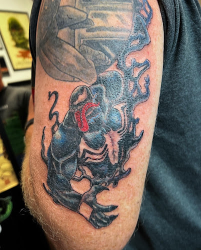 Work by Sanctum Tattoos and Comics