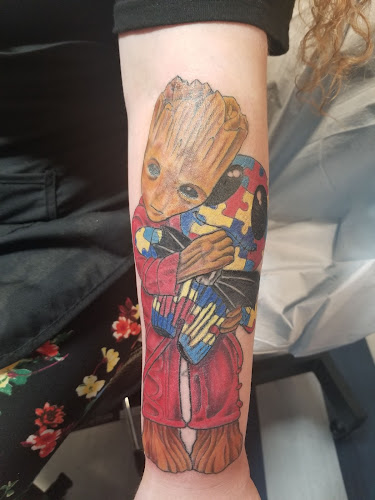Work by Hot Rod Tattoo