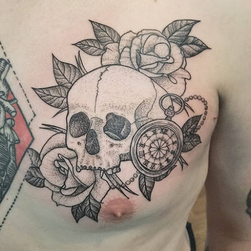 Work by Mourning Star Tattoo Studio