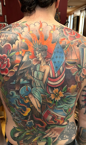 Work by BroadWing Tattoo and Body Piercing