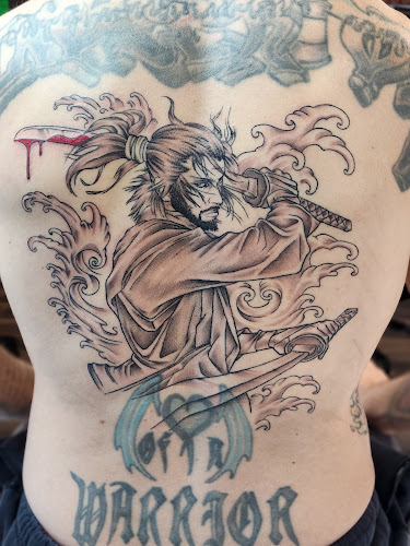 Work by Electric Rex Tattoo