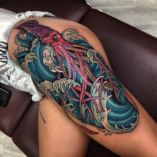 Work by Golden Rule Tattoo
