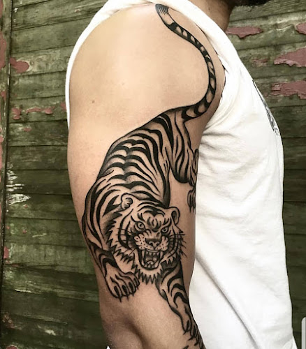 Work by Electric Anvil Tattoo & Piercing