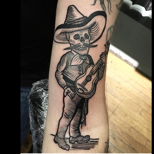Work by Itzocan Tattoos