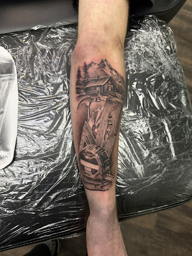Work by Nice Tattoo Parlor