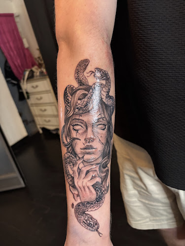 Work by Oblivion ink tattoos