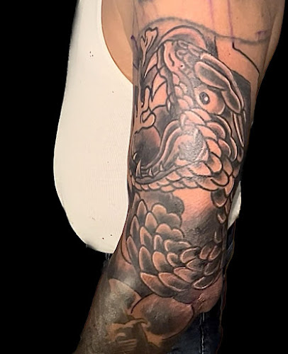 Work by Red Hook Tattoo Parlor