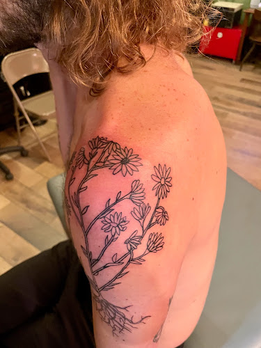 Work by Subversive Tattoo Parlor