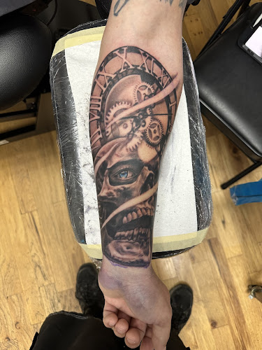 Work by Sacred Meadow Tattoo