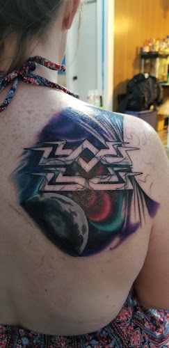 Work by Arsenal Tattoo & Design