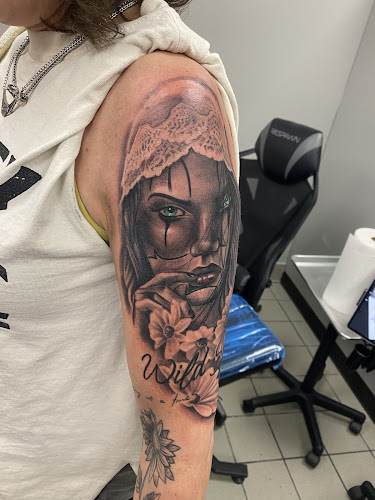 Work by Ink Asylum Tattoo Co.