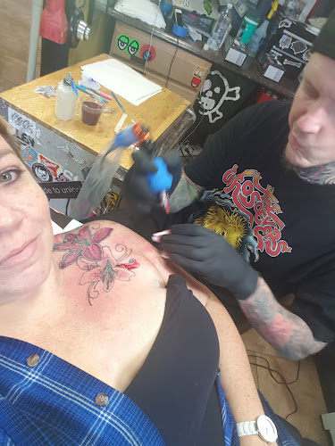 Work by Electric Empire Tattoos LLC