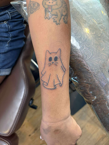 Work by Doolittle Electric Tattooing