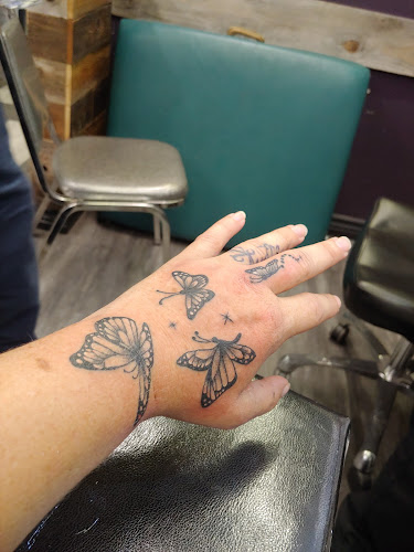 Work by Nathan's Tattoos and Piercings